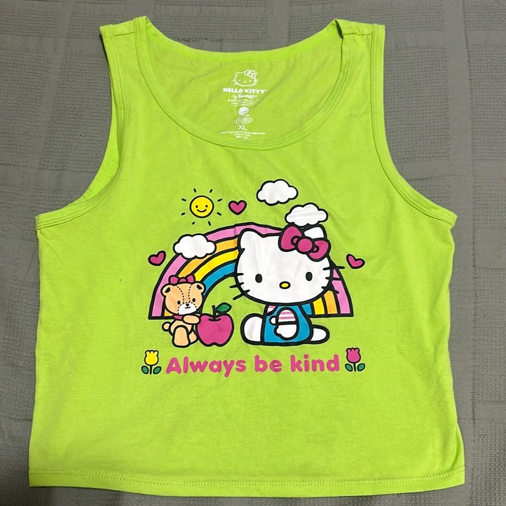 Hello kitty green top size Xl runs like L.